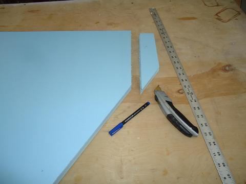 I used an utility knife and metal ruler to cut the foam.