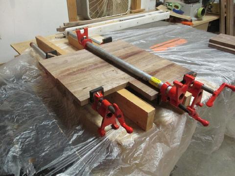 Gluing up walnut planks for the forward most part of the cabin sole.