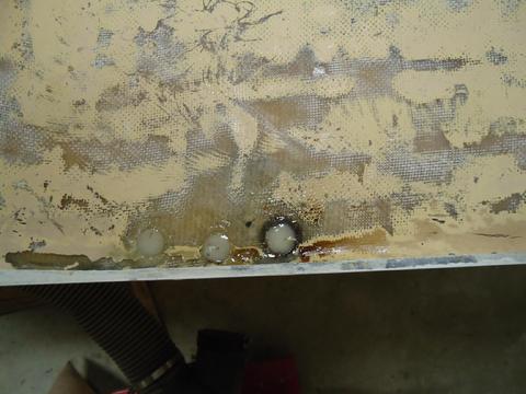 The drilled out holes filled with thickened epoxy.