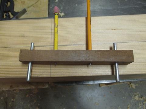 This is my home built 7-10-7 guage. This device allows you to turn a square into a rounded spar. I learned about it from Greg Rossel's book "A Boatbuilders Appr