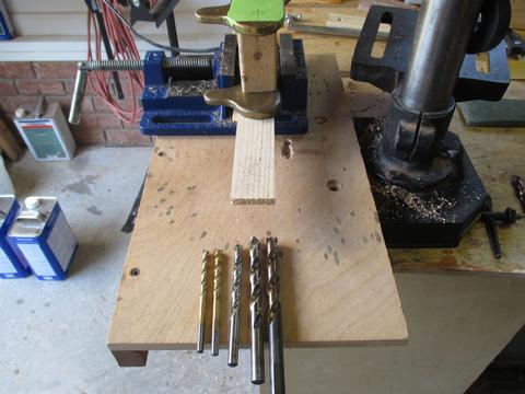 I used a series of bits, drilling in sequence, to maintain straight centered holes and to make it easier to dril the holes.