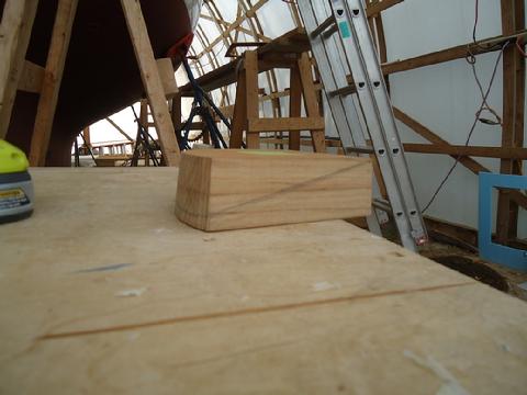 I scribed the camber of the deck top to the block of teak so I could cut the required angle.