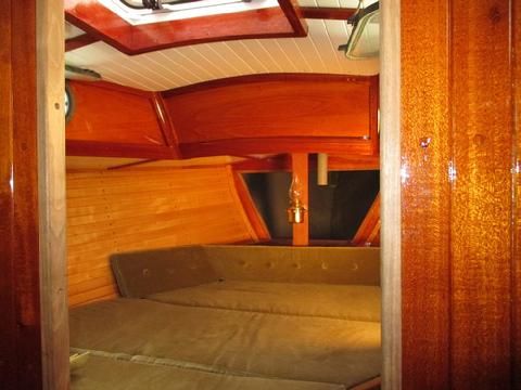 The double berth. Originally, there was a typical V berth. I think a double berth is far more useful. Tons of storage underneath. I need to apply varnish to the