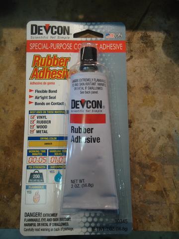 Devcon rubber contact cement as recommended by Spartan Marine. Once tube did all 10 portlights.