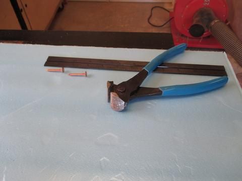 I used copper roofing nails and nippers to make the rivets.