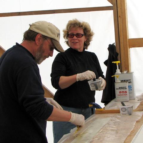 Gayle and Bruce wetting out biaxial tape.