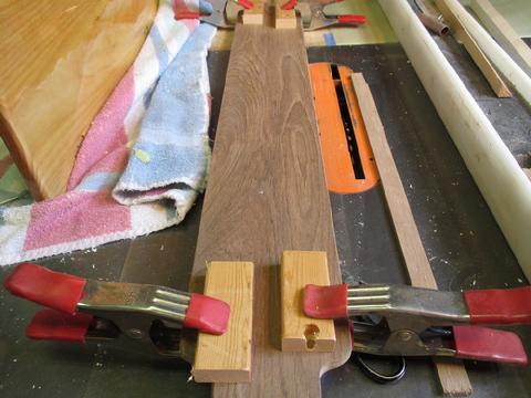 I clamped blocks on the fiddle to ensure it was lined up correctly. Then, I placed it right side up on the edge of the table and tapped it with a mallet. That m