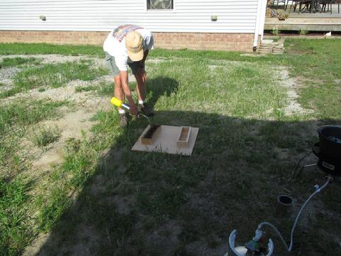 Tricia used a propane torch to char the inside of the wood molds. This made it less likey they would catch fire when the 650 degree lead was poured. Also, it en