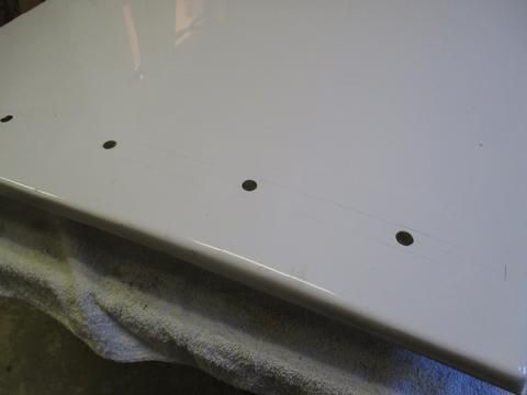 I filled the holes with epoxy and after they cured I drilled back through for the #10 screws and chamfer the tops.