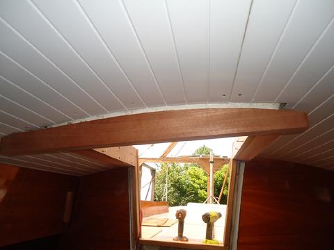 Initiall fitting of part of the forward companionway arch.