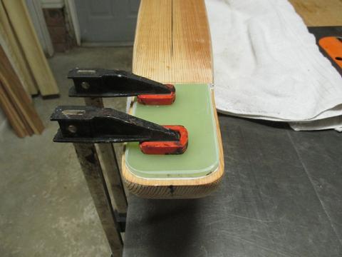 This is the underside of the bowsprit showing the G10 plate I attached with 5200. This will prevent the bowsprit from sitting on a damp surface.