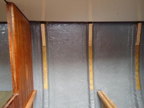 The insulation will fit between these ribs and eventually run all the way to the bottom of the lockers.