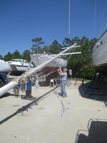 There is no wire rigging attached to the mast as I can't measure it for final cut length till the mast is in the boat. Much of the rope has been added just for