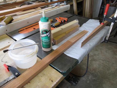 I clamped one side down so it would not slide away when I clamped the boards together. I used Tightbond III.