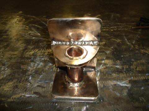 A silicon bronze stanchion base before dilling the mounting holes.