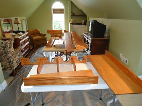 Our upstairs guest room converted into a temporary varnish booth. This photos was taken after the second coat of Epifanes High Gloss varnish.