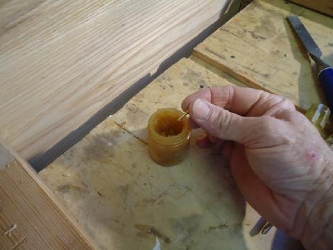 I like to dip the fasteners in wax before I install them into hardwood.