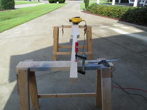 I carefully cut well outside the line to remove the excess from the plank that will comprise the blade end of the oar.