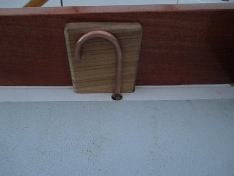 I used a piece of scrap 1/4" diameter copper tube and a teak spacer block.