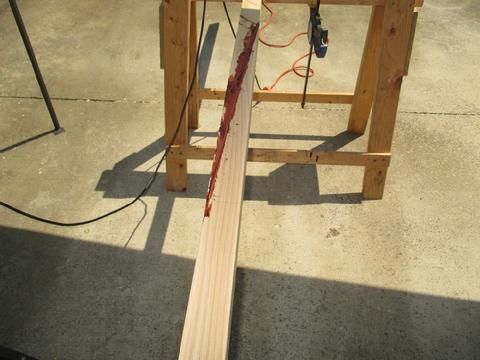 After I unclamped the scarf I move the rough shaped oar outside and laid it across three saw horses.