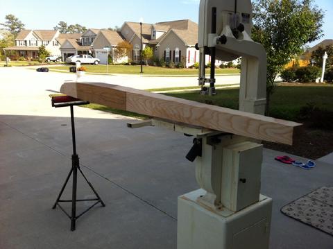 I hauled the timber over to my friend Tom's house. He has a bandsaw. I cut the wedges off that I had laid out with a straight edge and pencil.