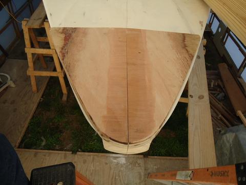 The deck plate pattern is being test fitted on the bow of the Far Reach. I used a hand smoothing plan to create "draft" (slight taper from the part line to the