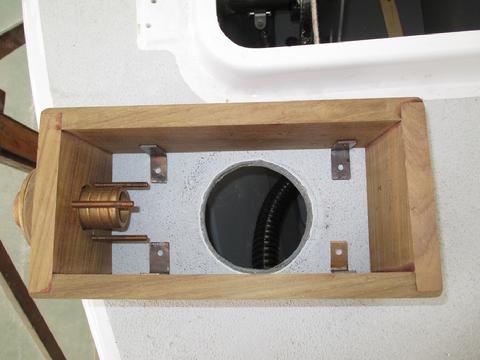 Using the original hole in the deck I could not slide the box further aft. I did not want to move it forward either as I want the bilge exhaust to clear the dec