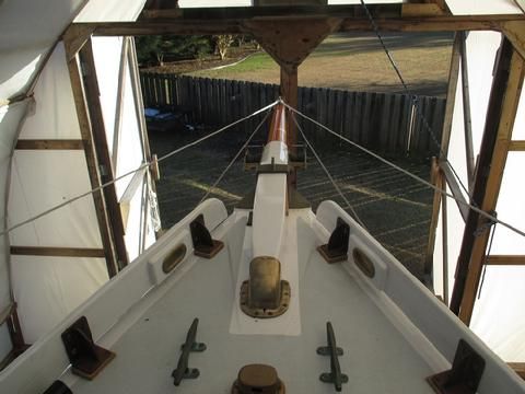 I spliced cow hitches in the forward end of the lines and attached them to a shackle on the kranze iron.