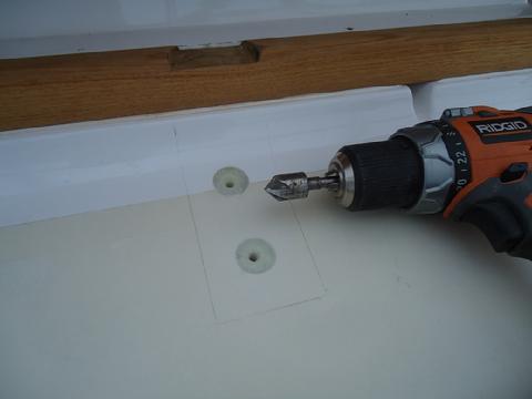 I chamfered the holes so the bedding compound will be driven down around the bolts making it more water tight.