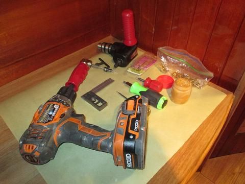 The tools I use for installing cabinet doors. The right angle attachments are essential when the dimensions are too small for to allow the drill to fit in the o