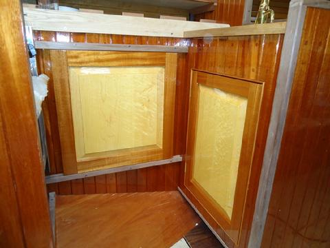 Galley sliding door and sink cabinet door.