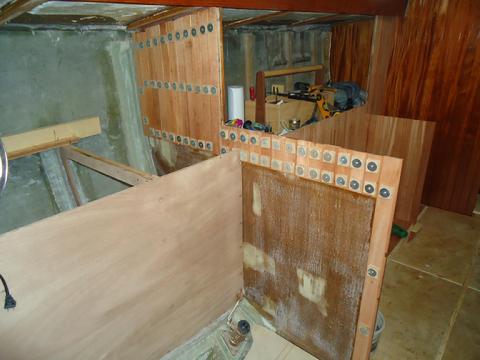 Staving installed around galley. No staving will be installed behind the sink cabinet.