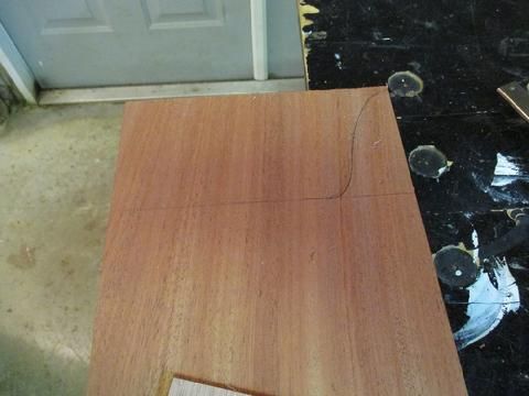 I made a pattern from a piece of doorskin ply so the curved parts would be the same on each side of the book case.