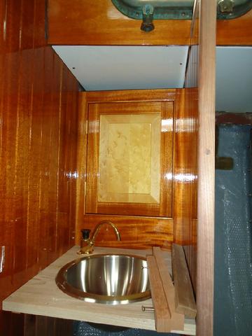 Cabinet door over the head sink.