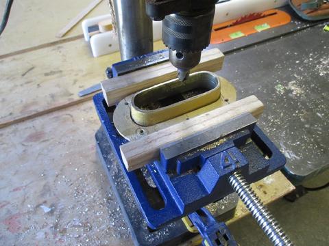 This is an inexpensive machine vise I bought at Harbor Freight a few years ago. It has worked great. I took this picture just to show how the set up looked but