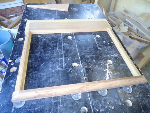 The frame with the various bevels and dado cuts.