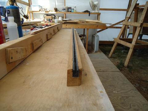 The UHMW is set below the teak about 1/32" to allow it to be trimmed flush in the planer.